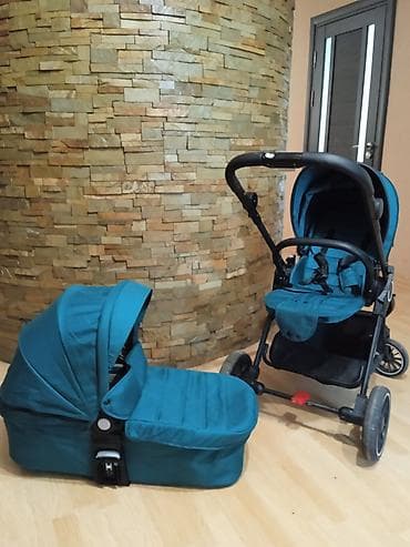 коляска уоуо: Универсальная детская коляска 2-в-1, цвет бирюзовый. Особенности: - — 6