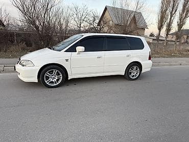 на вариант: Honda Odyssey: 2003 г., 2.3 л, Автомат, Газ, Минивэн — 1