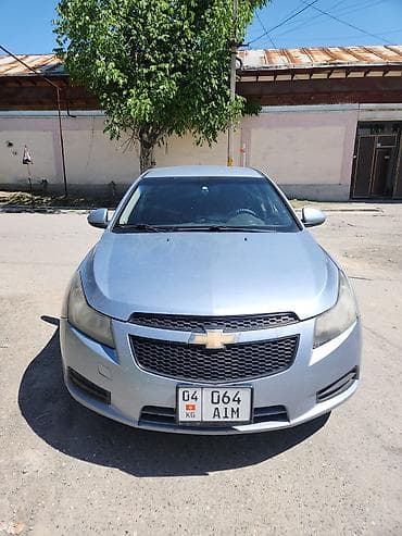 mazda 323: Chevrolet Cruze: 2010 г., Седан — 1