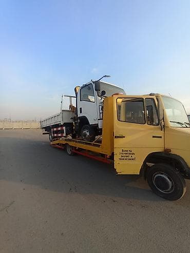 ось на легковой прицеп: Эвакуатор, Mercedes-Benz, Ломаная — 1