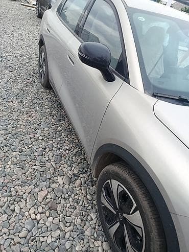 Changan: Электромобиль чанган (кроссовер) Основные особенности: - Современный — 4