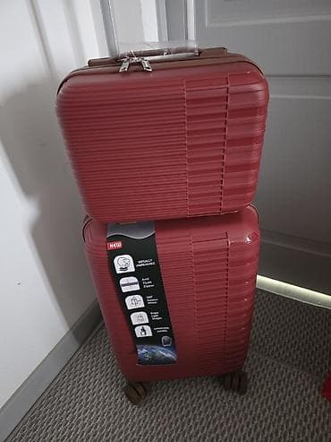 зонт от солнца: Набор чемоданов на колесах - Жесткие чемоданы из легкого материала — 2