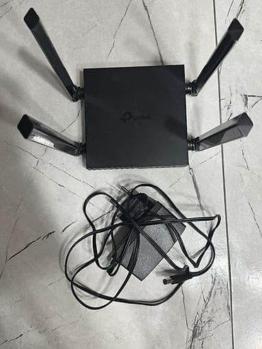 Модемы и сетевое оборудование: Wi‑Fi роутер TP‑Link Archer C54 AC1200 с четырьмя внешними антеннами — 2
