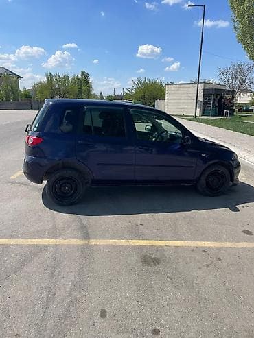 Mazda Demio: 2004 г., 1.5 л, Автомат, Бензин, Хэтчбэк