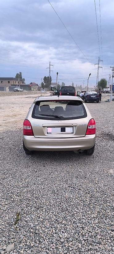 Унаа: Mazda Familia: 2003 г., 1.5 л, Автомат, Бензин, Универсал — 2