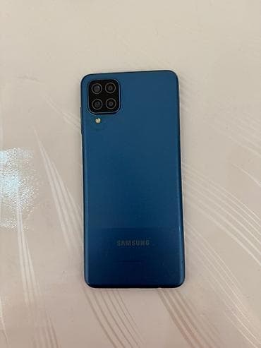 Samsung Galaxy A12 (модель SM-A127F/DS), сине‑голубой цвет