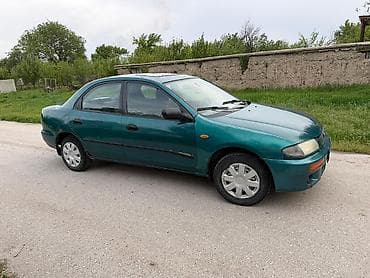 mazda 2: Mazda 323: 1996 г., 1.5 л, Ручные, Бензин, Седан — 4