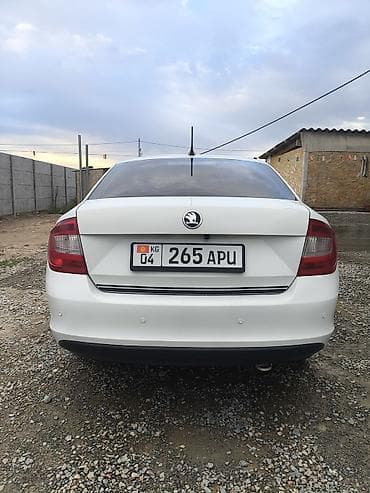Унаа сатуу: Skoda Rapid: 2014 г., 1.6 л, Автомат, Бензин, Седан — 2
