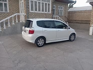 скутер электр: Honda Fit: 2005 г., 1.5 л, Автомат, Бензин, Хэтчбэк — 4