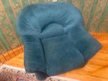 Мягкое кресло с глубоким посадочным местом и выраженной анатомической