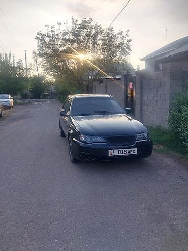 kia mording: Черный седан (номер KG 018 AEC), тюнингованный внешний вид. Основные — 2