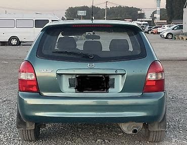 Mazda 323: 2003 г., Автомат, Бензин, Универсал