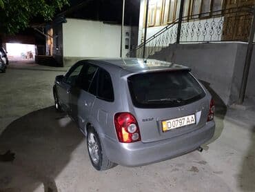 авто бафер: Mazda 323: 2002 г., 1.6 л, Механика, Бензин, Универсал — 4