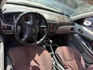 маленькие колонки: Nissan Almera: 2002 г., 1.5 л, Ручные, Бензин, Хэтчбэк — 5
