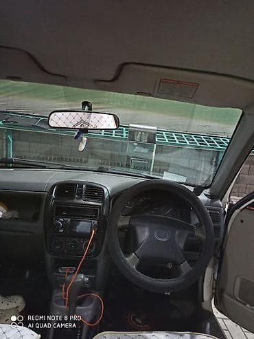 тачки б у: Mazda Demio: 1999 г., 1.4 л, Автомат, Бензин, Минивэн — 5