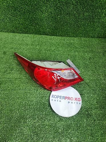 Задний внешний фонарь (левый или правый в зависимости от модификации)