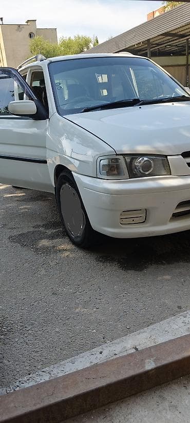 mini copper: Mazda Demio: 1998 г., 1.3 л, Автомат, Бензин, Универсал — 5