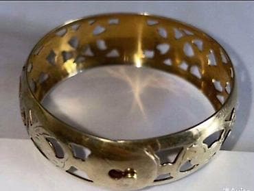 honor bend: Серебряный браслет с позолотой с ажурным орнаментом. В центре браслета — 2
