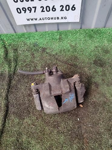 Суппорттор: Алдыңкы оң суппорт Toyota 1999 г., Оригинал — 1