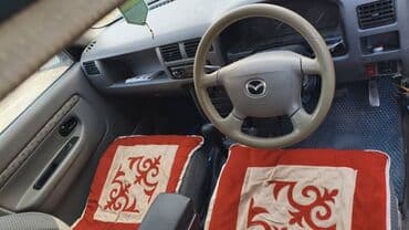 не бит не крашен: Mazda Demio: 1997 г., Хэтчбэк — 4