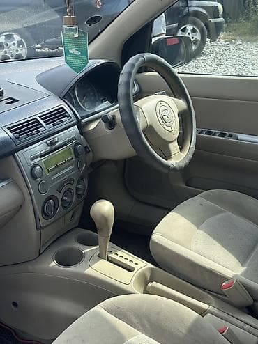 Mazda Demio: 2004 г., 1.3 л, Автомат, Газ, Хэтчбэк — 5