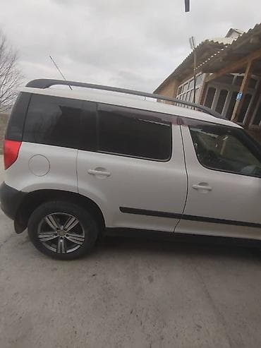 шкода октавия а7: Skoda Yeti: 2010 г., Бензин, Кроссовер — 4