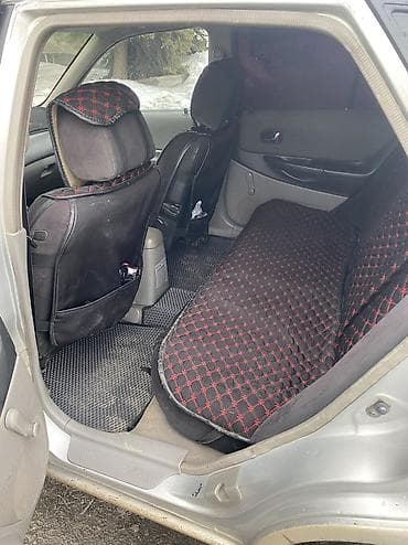 180 sx: Mazda 323: 2002 г., 1.6 л, Механика, Бензин, Хэтчбэк — 6