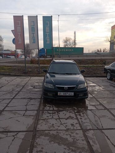 купить держатель номера на авто: Mazda 323: 2003 г., 1.6 л, Механика, Бензин, Хэтчбэк — 7