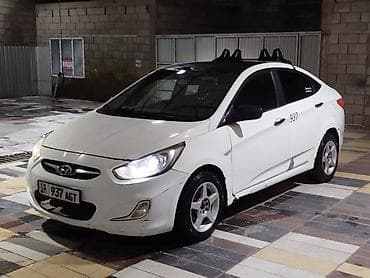 вложений: Hyundai Solaris: 2011 г., 1.4 л, Механика, Газ, Седан — 2