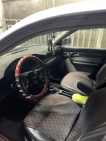 глушитель авто: Audi 100: 1991 г., 2 л, Механика, Бензин, Седан — 5