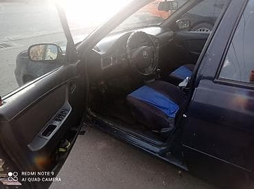 ford focus 2002: Седан темно-синего цвета на киргизских номерах (KG, номер 399 ATY) — 4
