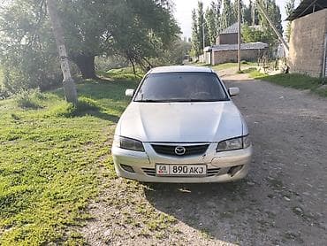 керме тоо: Mazda 626: 1999 г., 1.8 л, Кол менен иштөөчү, Бензин, Седан — 6