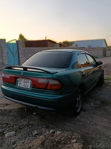 субару сатып алуу: Mazda Familia: 1997 г., 1.6 л, Автомат, Бензин, Седан — 6
