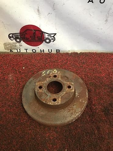 Тормозной диск Mazda Demio DW3W, 2001 г., передний левый (б/у). -
