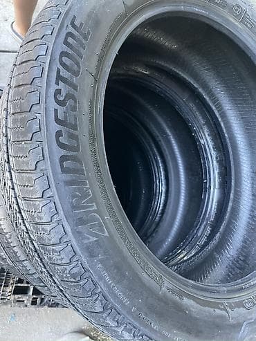 pump wedge: Шины 275 / 45 / R 20, Всесезонная, Комплект, Внедорожные (АТ/МТ), Bridgestone — 2