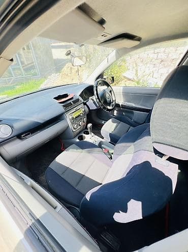 Продажа авто: Mazda Demio: 2003 г., Автомат, Хэтчбэк — 3