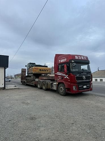 Авто кызматтары: Услуги низкорамных панелевозов/траллов для перевозки спецтехники и — 1