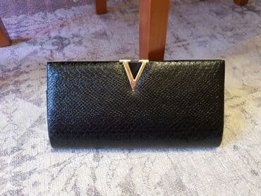 Клатч (новый)
Размер 27*15 см
В комплекте ремешок-цепочка