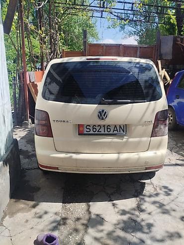 для такси авто: Volkswagen Touran: 2010 г., 1.9 л, Автомат, Дизель, Минивэн — 5