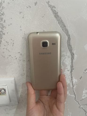 телефон коко: Samsung Galaxy J2 2016, Б/у, 8 ГБ, цвет - Золотой, 2 SIM — 3