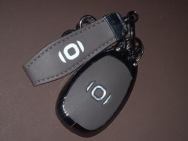 Аксессуары для салона: Продаётся чехол для ключей CHANGAN Q05 коричневый цвет доставка — 5