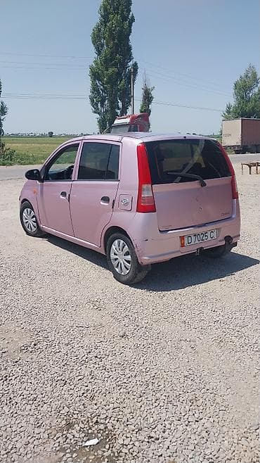 fj cruser: Daihatsu Cuore: 2004 г., Механика, Бензин, Хэтчбэк — 3