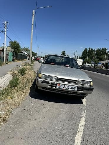 210 mers: Mazda 626: 1988 г., 2.2 л, Механика, Бензин, Седан — 7