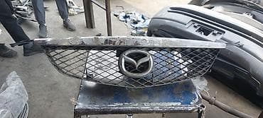 mini v: Решетка радиатора Mazda Оригинал — 7