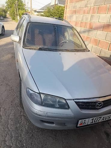Mazda Familia: 2000 г., Механика, Бензин, Универсал — 4