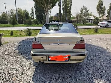 арзан матиз 1: Daewoo Nexia: 2006 г., 1.5 л, Кол менен иштөөчү, Бензин, Седан — 4