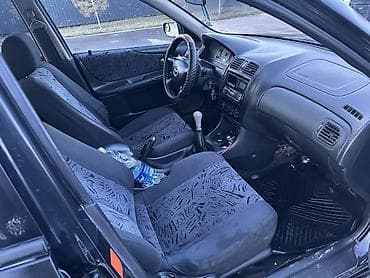 срочно мазда: Mazda 323: 2000 г., 1.8 л, Механика, Бензин, Универсал — 9