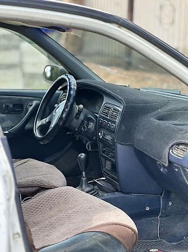124 e500: Nissan Primera: 1993 г., 2 л, Механика, Бензин, Седан — 8