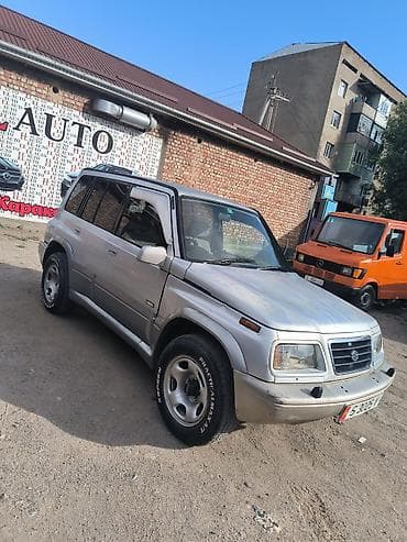 выбор номера о: Suzuki Escudo: 1996 г., 2.5 л, Бензин, Внедорожник — 2
