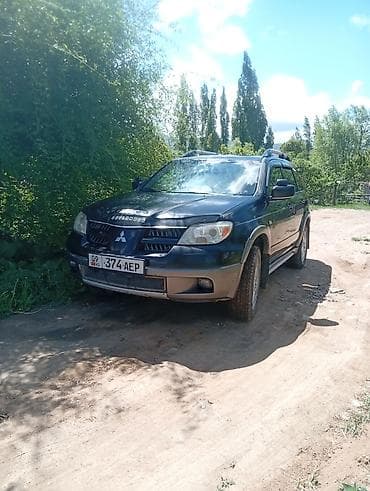 Mitsubishi Outlander: 2004 г., 2.4 л, Автомат, Бензин, Кроссовер — 1